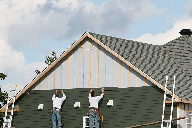 Professional Siding technician working in Columbus, MN